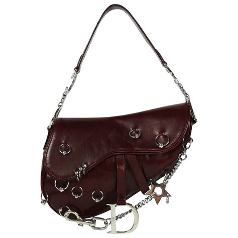 dior pierced saddle bag